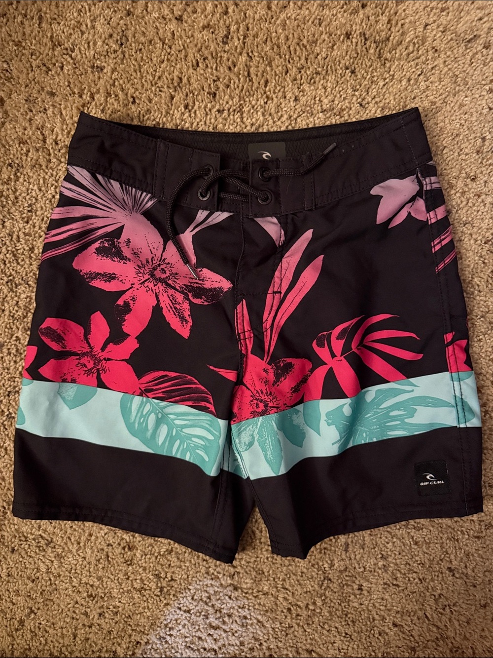 Rip Curl Black Swim Trunks with Pink Hawaiian Flowers & Teal Stripe